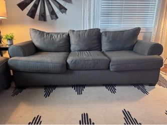 Gray sofa and loveseat