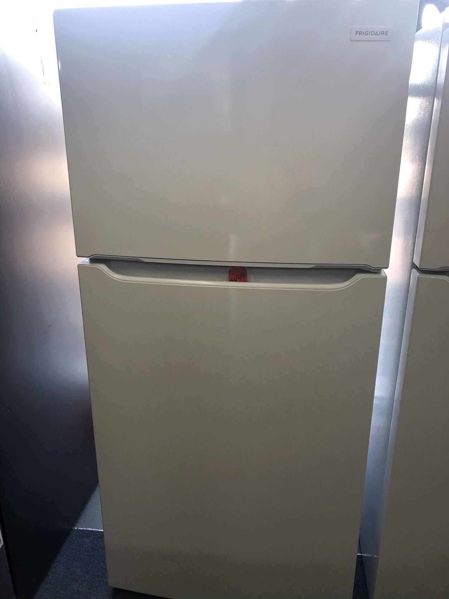 New scratch and dent Frigidaire 17 cu ft top and bottom fridge. 1 year warranty