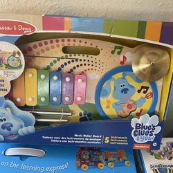 Melissa & Doug Blue's Clues & You! Wooden Music Maker Board (5 Instruments)