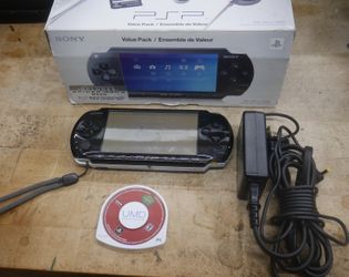 Sony PSP-3001 Black Bundle w/ Battery, Charging Cable GAME BOX USED TESTED . IN A GOOD WORKING ORDER. WITH POKER 2 GAME. F(contact info removed)8.
