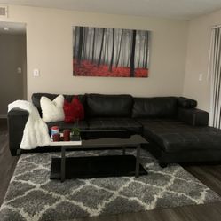 Black, leather sectional