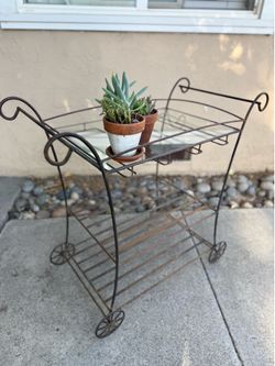 Iron rolling glass top cart for plants or serving