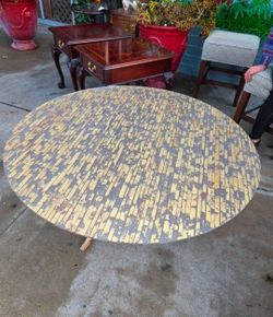 Mid Century Round Table With A Distressed Gold Leaf Finish