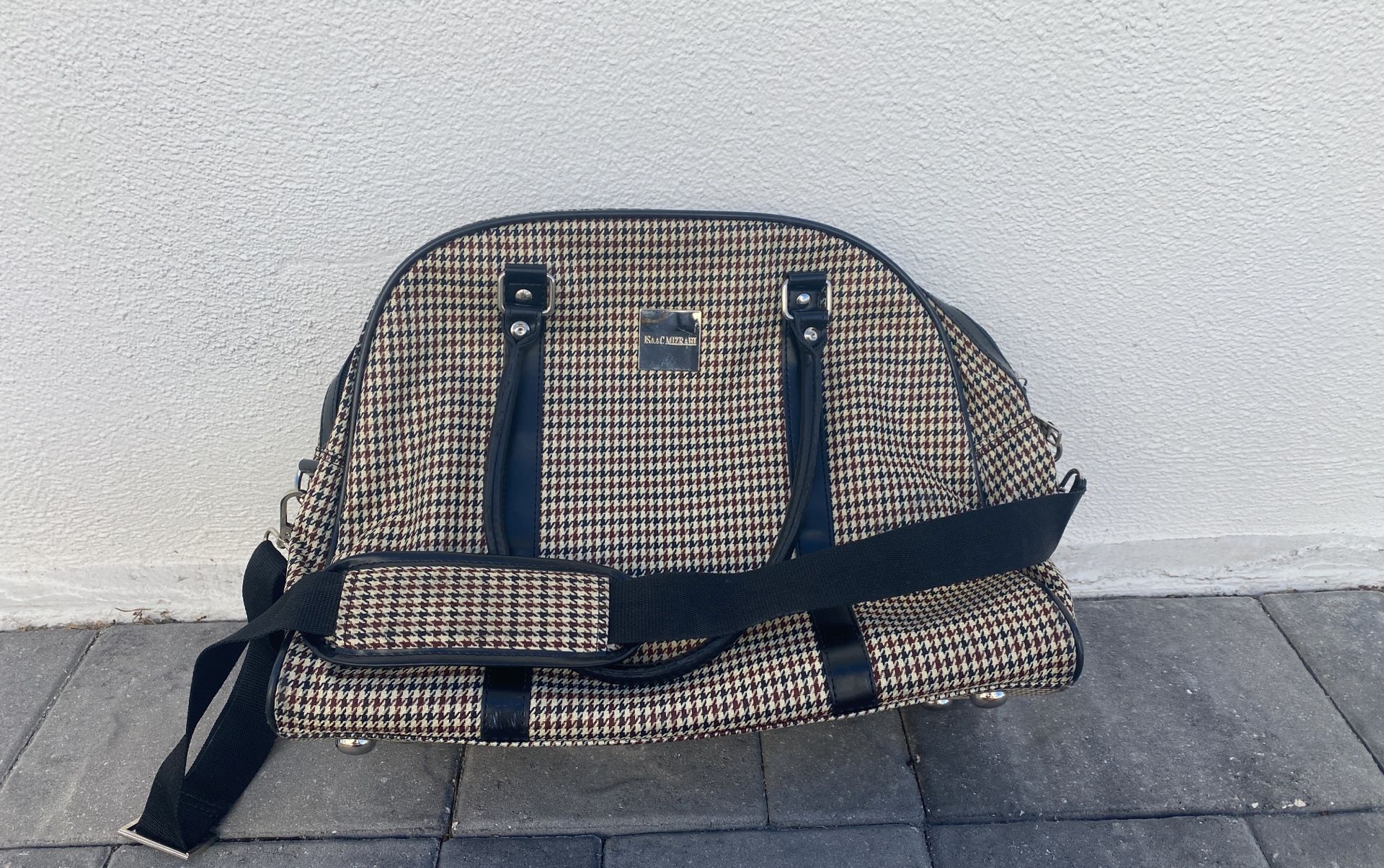 Issac Mizrrahi Carry On Bag Measures 9Lx17Wx13H. Lightweight, and stylish. Carry it over your shoulder or by the handles.