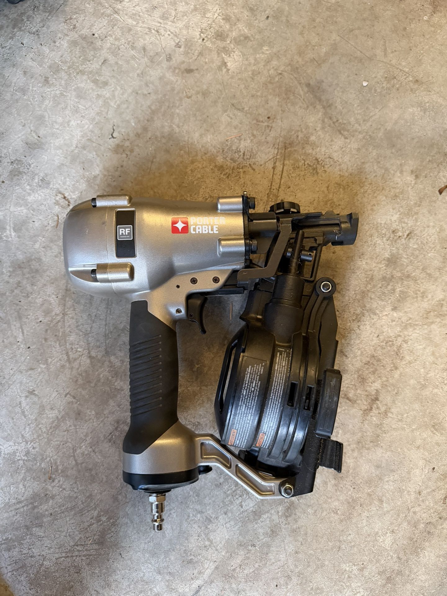Porter Cable Pneumatic nail gun for roofing or fencing.