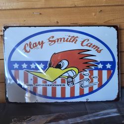 2 Clay Smith metal signs