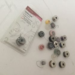New Bobbin Case And 19 Used Bobbins Mix.