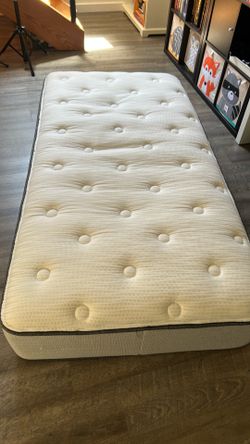Twin mattress with a frame