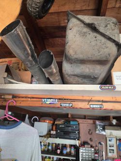 1954 Ford F-100 gas tank and exhaust pipes.