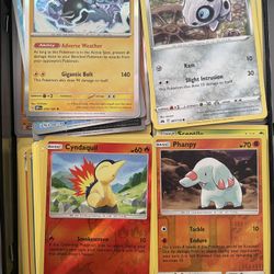 700+ Pokemon Cards w/ Charizard Tin Box