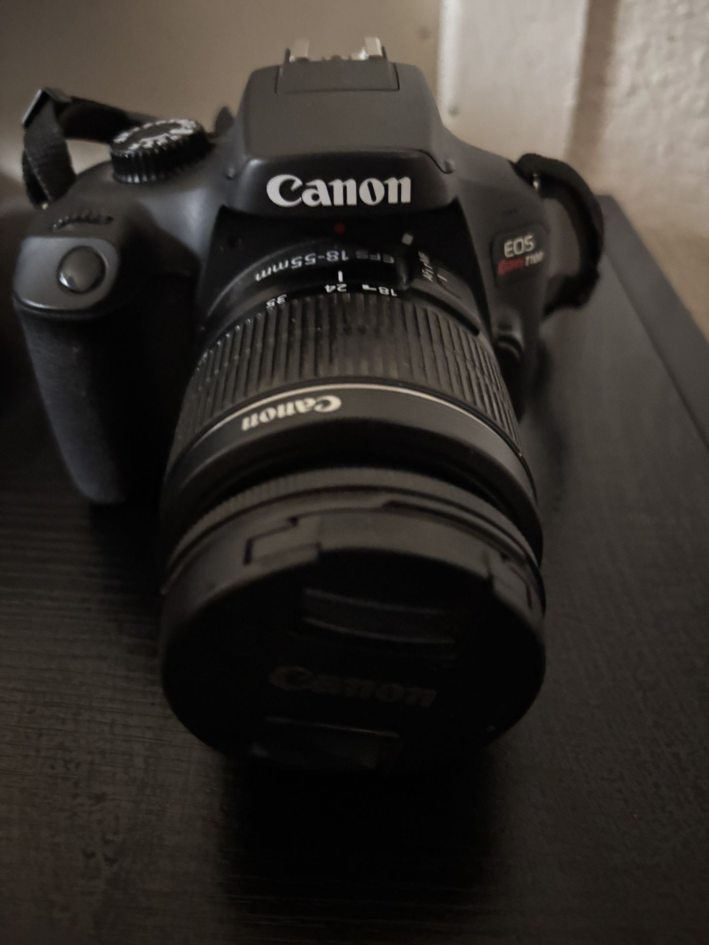 Canon T100