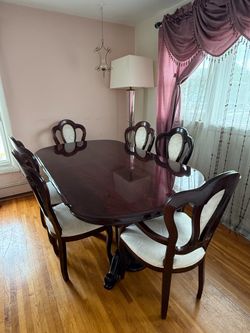 Dining room table w/ china cabinet, entry table and mirror