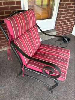 Wrought iron chair with cushion