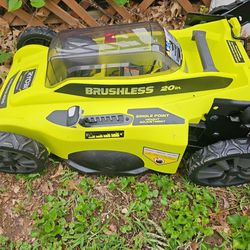 Brand New RYOBI 20 Inch Lawnmower With Battery And Charger And Bagger