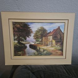Framed Print Of a Painting (River Hut)