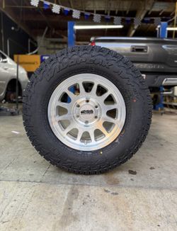 New Wheels & Tires Package Deal Method MR703 Machined 265/70R17 Falken Wildpeak AT4W Tires WE FINANC