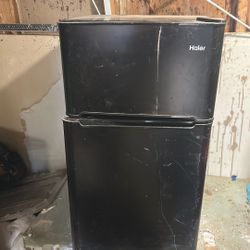 Small Refrigerator With A Freezer 