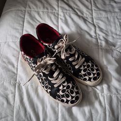 Coach tennis shoes leather maid white sole