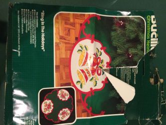 Nicolle ring in the holiday tree skirt