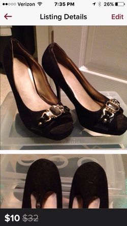 Black heels. Pumps. Open toe.