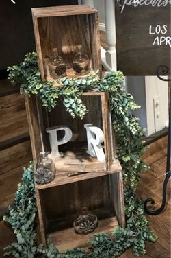 3 wood boxes and greenery