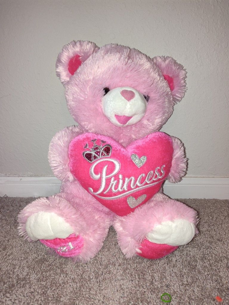 Pink teddy bear with heart