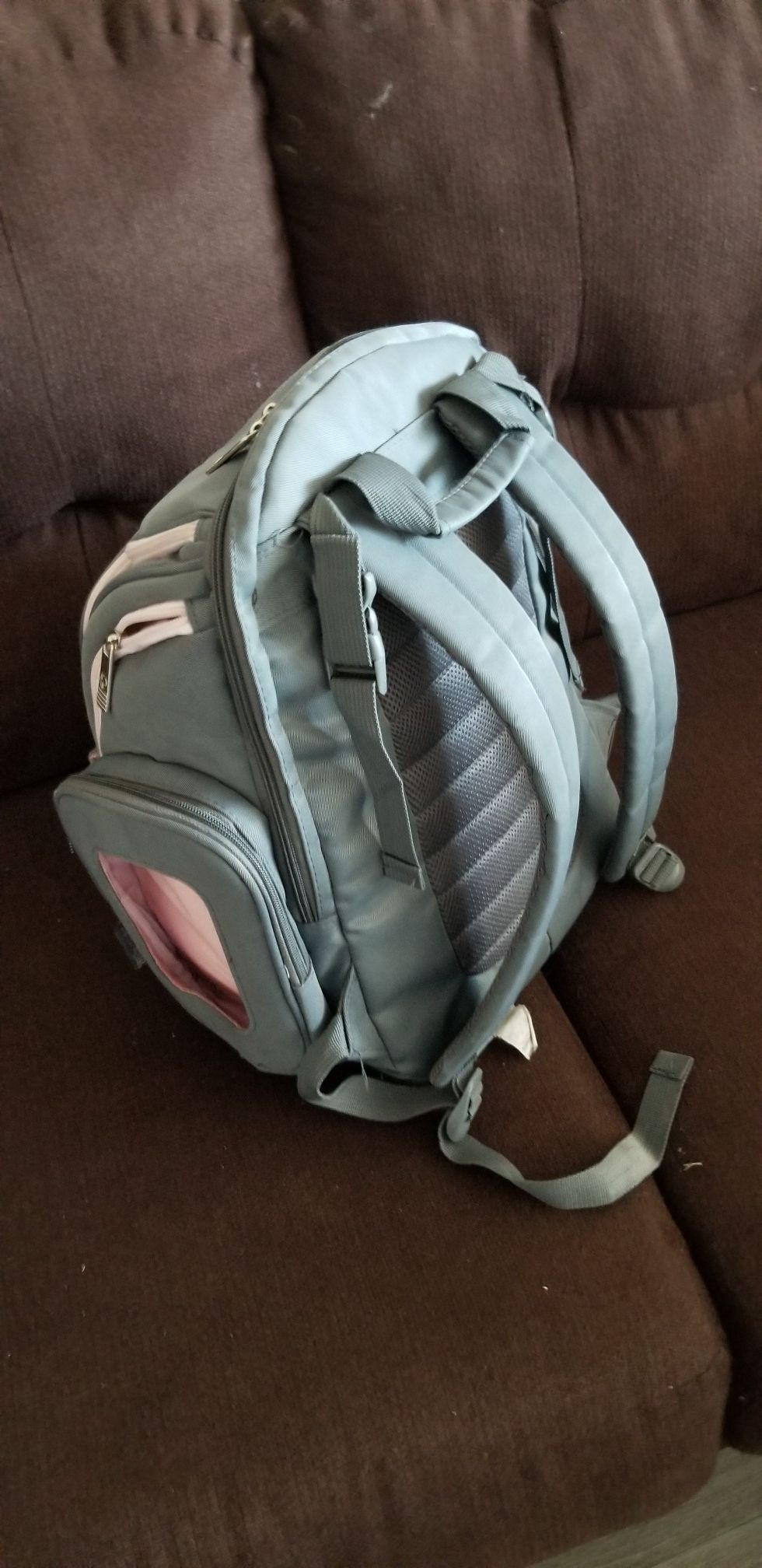 Diaper bag filled with clothes