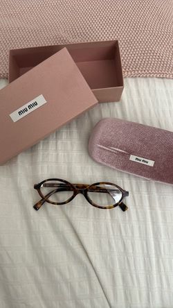 Miu Miu oval glasses