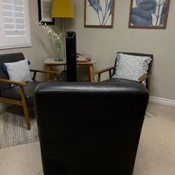 Black Faux leather Arm chair