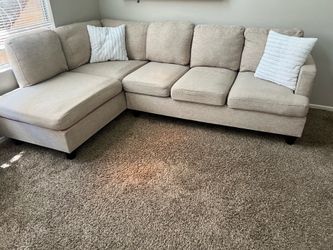 Beige sectional couch