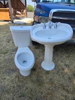 Toilet and pedestal sink