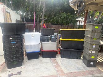 26 moving totes with lids, good condition