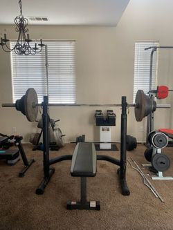 Complete 300 lb Olympic Weight Set with Adjustable Squat Rack & Bench