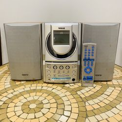Vintage Antique! TEAC CD Player - AM/FM Radio - Stereo Cassette Player/Recorder with Remote Control. Sporting sleek, silver casing, this system featur