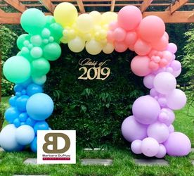 Grass wall and balloons garland