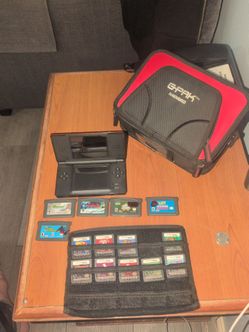 Nintendo ds lite with 13 ganes and case great condition only missing  pen