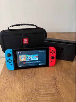 NITENDO SWITCH W/DOCK, CHARGER, & TRAVEL CASE.