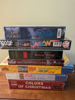 New and Rare 1000/2000 Piece Jigsaw Puzzles - $15 Each
