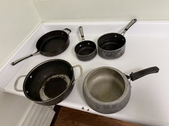 Two pieces of cookware (from a collection of five).