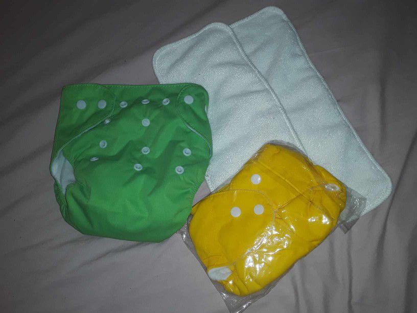 2 Brand New Reusable Diapers With Pads