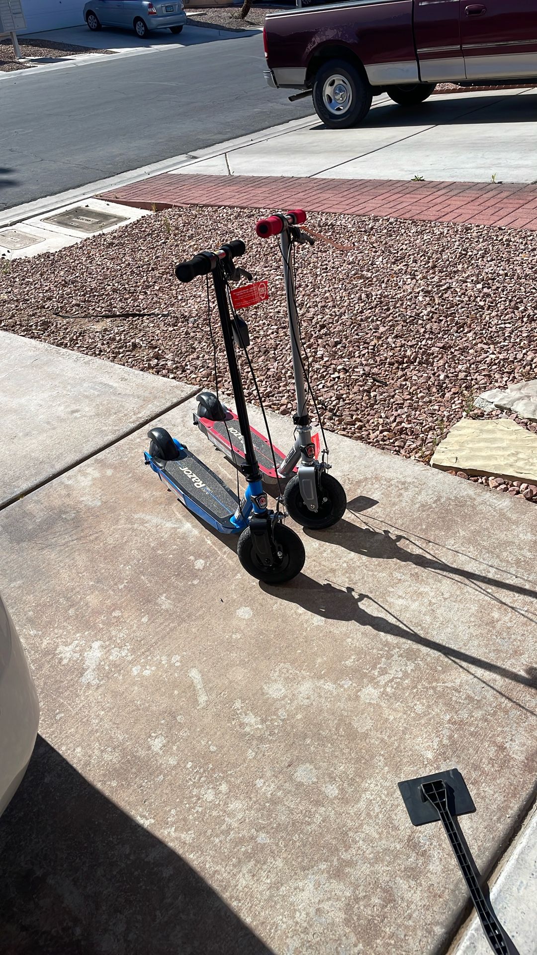 Two brand new razor scooters cost 150 each asking $100. Each one is red and one is blue. It holds up to 128 pounds so kids from five until 1 until 10.