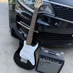 Squier Mini Stratocaster electric guitar paired with a Fender Frontman 10G amplifier