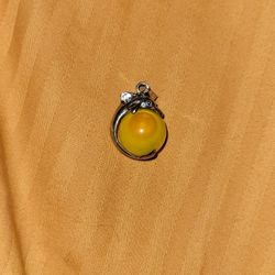 Dolphin Holding Yellow Crystal 