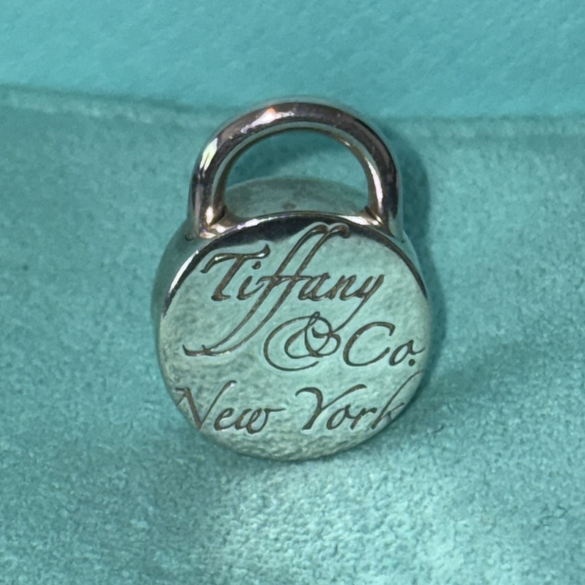 Tiffany & Co. Circle Notes Padlock Charm