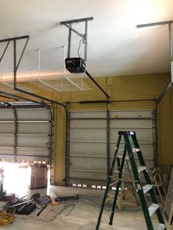 Overhead Garage Door Opener Broken Spring Off Track Replace Adjustment And Parts