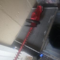 Battery powered hedge trimmer