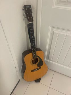 Yamaha Acoustic Guitar with Case