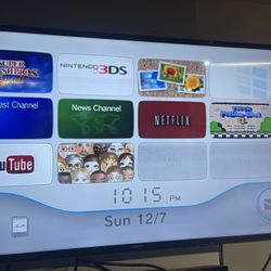 Nintendo Wii Console with 3 Games