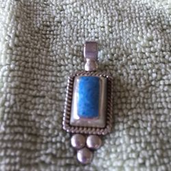 Turquoise Pendant Set In Sterling Silver