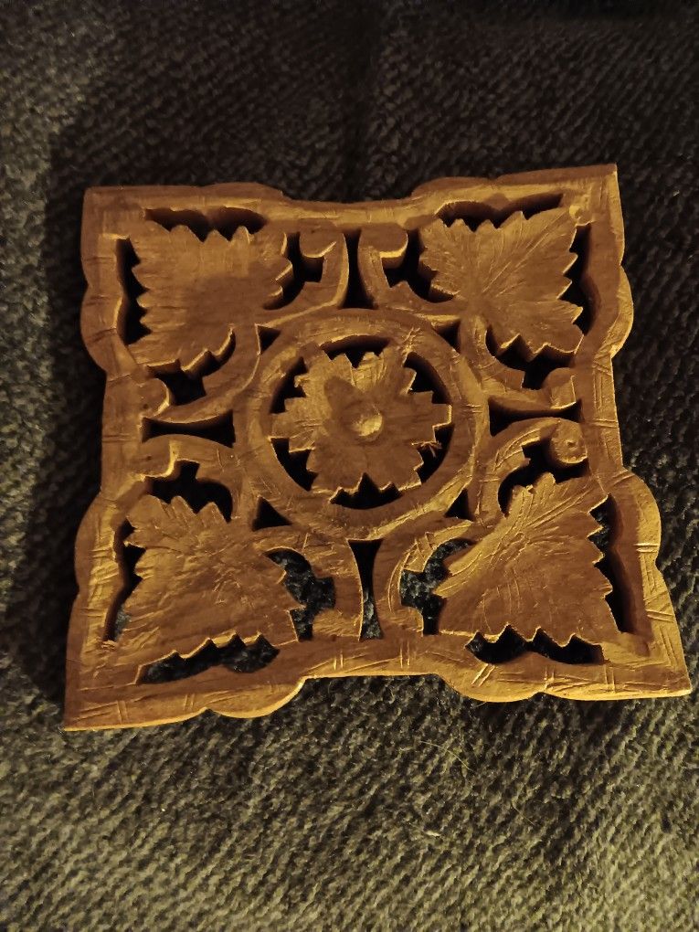 6 Hand caraved Trivets, plus a hand carved Key. Made In India.